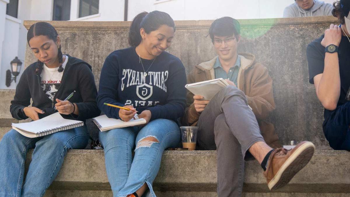 Students sitting outside in a class